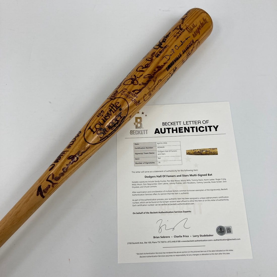 28-Signed Dodgers HOF Louisville Slugger Bat Beckett: 28-Signed Dodgers HOF Louisville Slugger Bat Beckett This is a Brooklyn Dodgers multi-signed Dave Anderson Louisville Slugger S318 game-issued bat featuring autographs from twenty-eight Dodgers player
