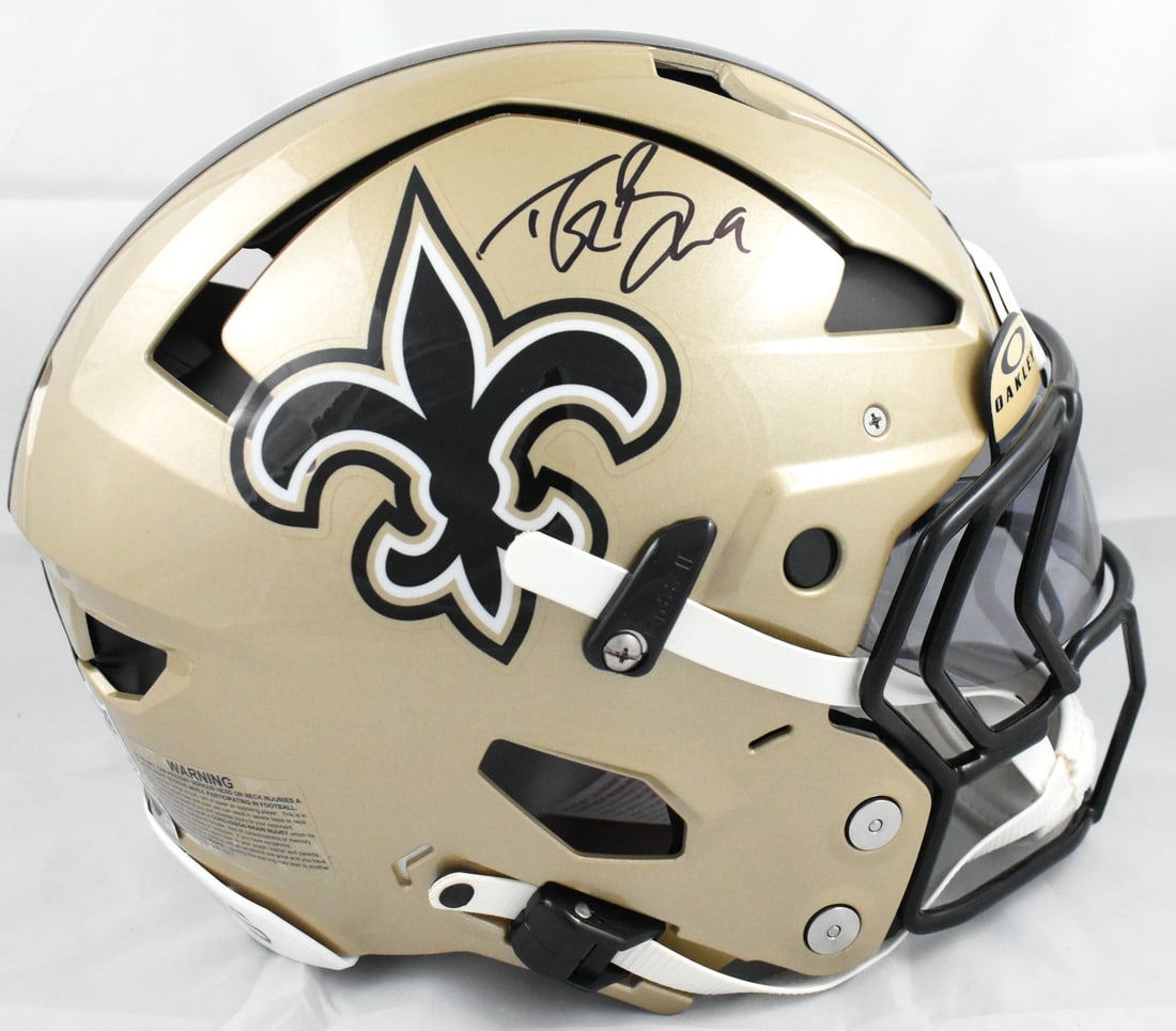 Full Size Axiom Saints Helmet Signed by Drew Brees Beckett Hologram: Full Size Axiom Saints Helmet Signed by Drew Brees Beckett Hologram Autographed full-size Axiom helmet featuring New Orleans Saints team styling. This football collectible includes Beckett Authenticat