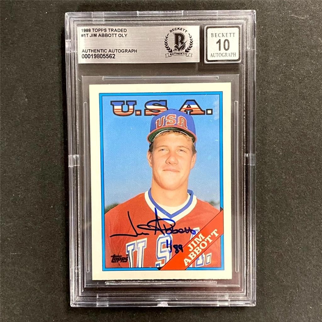 1988 Topps Traded 1T Jim Abbott Autographed USA Olympic Card BAS 10: 1988 Topps Traded 1T Jim Abbott Autographed USA Olympic Card BAS 10 Original 1988 Topps Traded USA Olympic #1T sports trading card signed by Jim Abbott. This hard-signed baseball card features Beckett