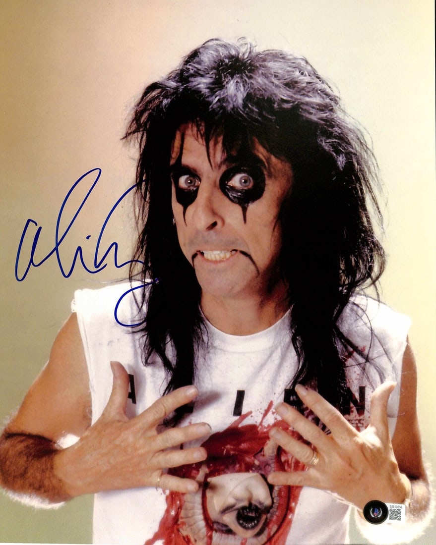 Autographed 11x14 Photo Alice Cooper Beckett Authenticated: Autographed 11x14 Photo Alice Cooper Beckett Authenticated This is an original 11x14 photograph signed by musician Alice Cooper in blue permanent marker. The autograph is authenticated by Beckett Auth