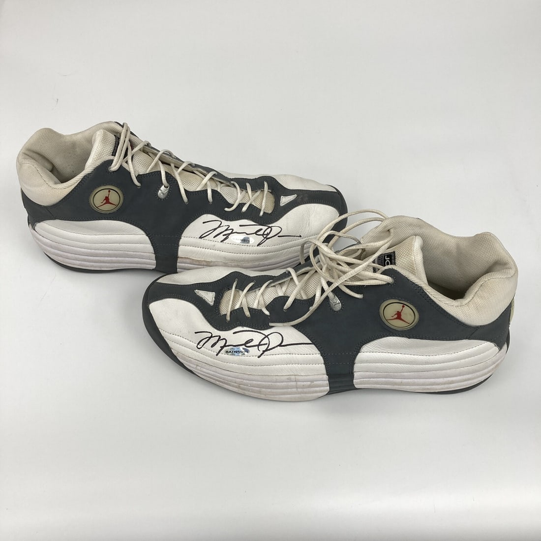 Pair of Nike Air Jordan Team 1 Sneakers Signed by Michael Jordan UDA PSA: Pair of Nike Air Jordan Team 1 Sneakers Signed by Michael Jordan UDA PSA Pair of Nike Air Jordan Team 1 sneakers signed by Michael Jordan on the outside of each shoe in black marker. This original dua