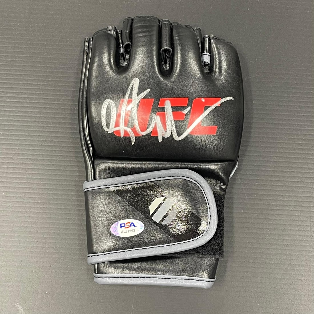 PSA DNA Certified Stipe Miocic Autograph Boxing Glove: PSA DNA Certified Stipe Miocic Autograph Boxing Glove Pre-owned glove signed by Stipe Miocic. This original autographed piece is authenticated by PSA/DNA and is associated with Mixed Martial Arts (MMA