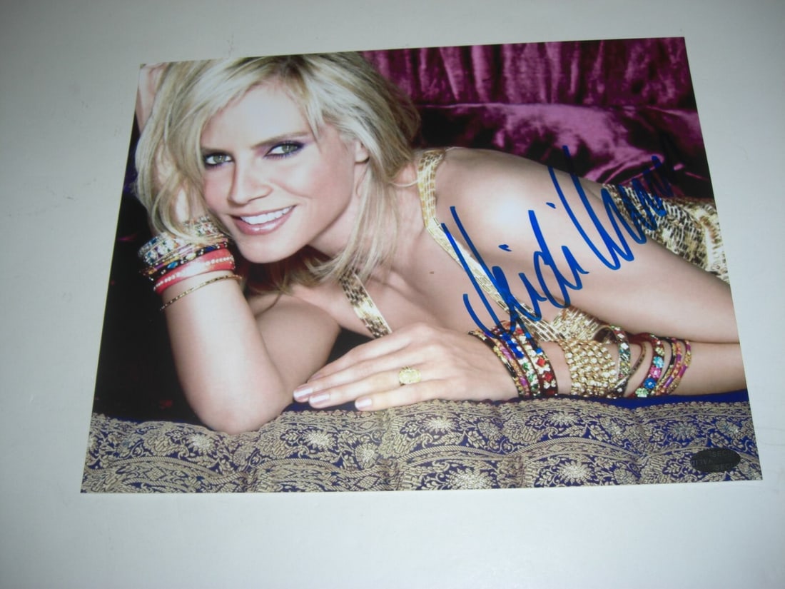 Signed 8x10 Photograph of Heidi Klum with Holographic Signature: Signed 8x10 Photograph of Heidi Klum with Holographic Signature This is an original 8x10 photograph signed by supermodel and actress Heidi Klum. The photo features a hologram sticker for added authent