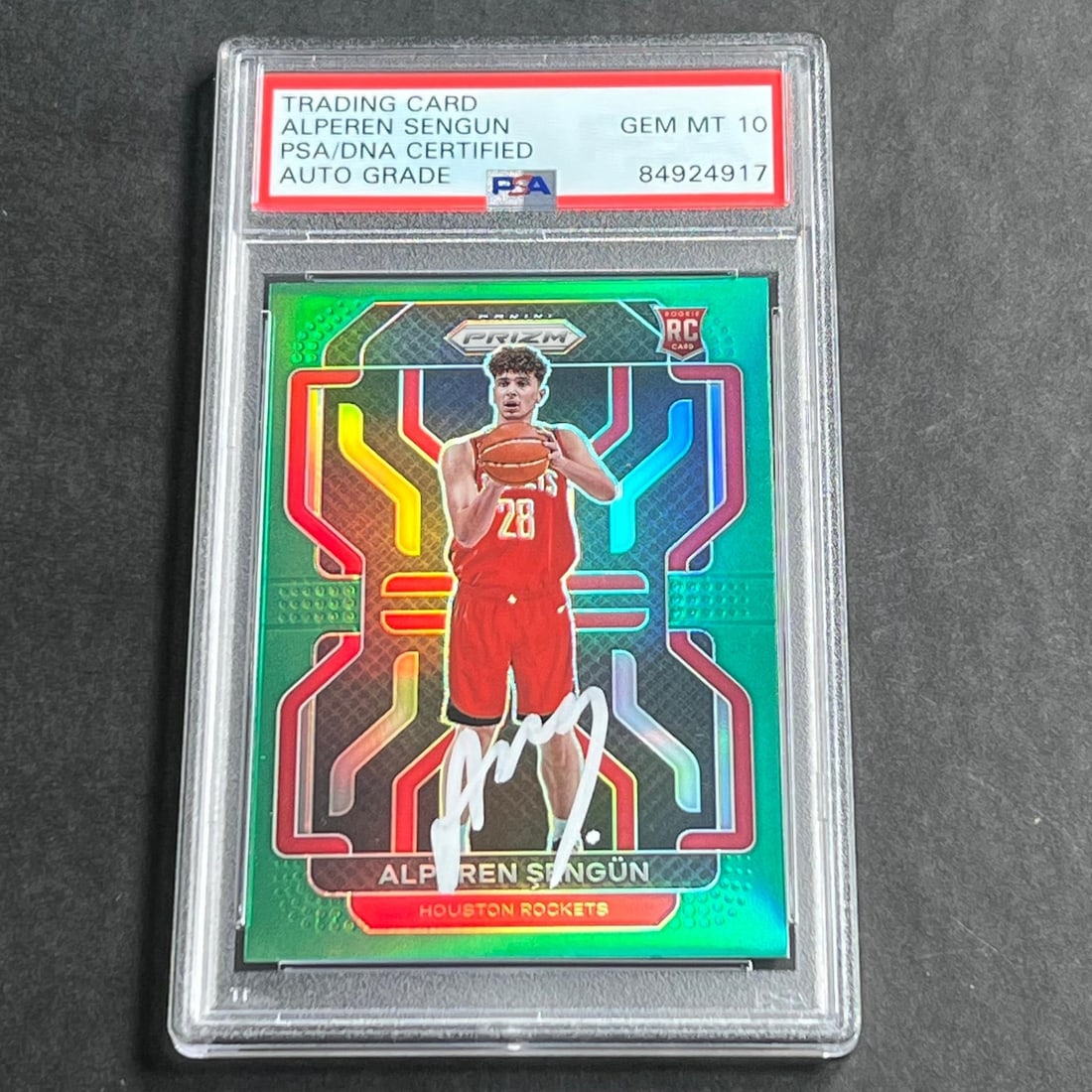 PSA 10 Alperen Sengun 2021-22 Panini Prizm Green #318 Rookie Auto: PSA 10 Alperen Sengun 2021-22 Panini Prizm Green #318 Rookie Auto 2021-22 Panini Prizm Green #318 Alperen Sengun rookie card featuring the Houston Rockets. The card is PSA slabbed and graded Gem Mint 