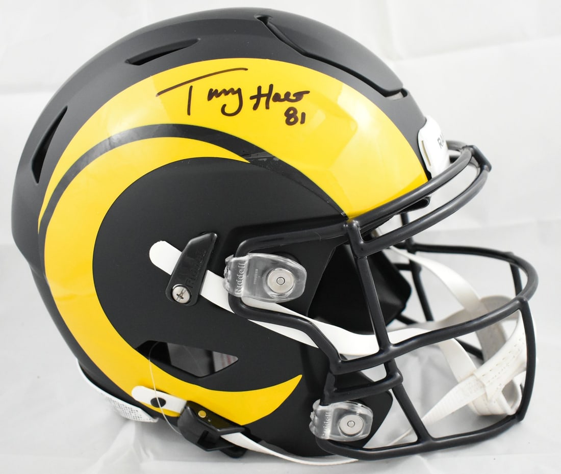 Rams Speedflex Rivalries Full Size Helmet Signed by Torry Holt BAS: Rams Speedflex Rivalries Full Size Helmet Signed by Torry Holt BAS Pre-owned full-size Rivalries Speedflex helmet autographed by Torry Holt. This football collectible features Rams team association an