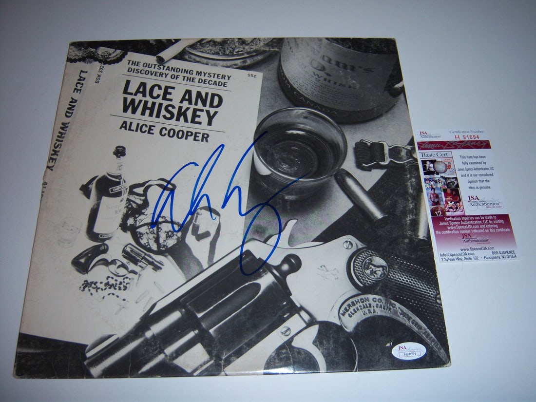 Signed Alice Cooper Lace and Whiskey LP Album JSA COA Certified: Signed Alice Cooper Lace and Whiskey LP Album JSA COA Certified This is an original "Lace and Whiskey" LP record album signed by Alice Cooper. The album comes with a JSA Certificate of Authenticity (C