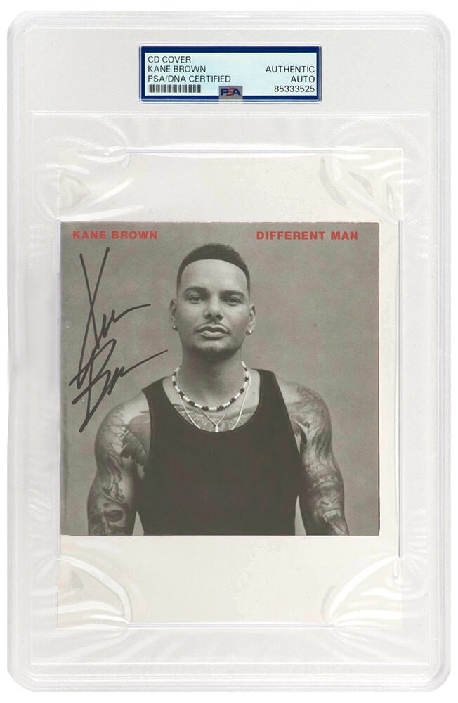 Kane Brown Signed Different Man 5x5 CD Cover PSA/DNA Authenticated: Kane Brown Signed Different Man 5x5 CD Cover PSA/DNA Authenticated This unique collectible features a signed 'Different Man' 5x5 CD cover by Kane Brown. Authenticated and encapsulated by PSA/DNA, the 