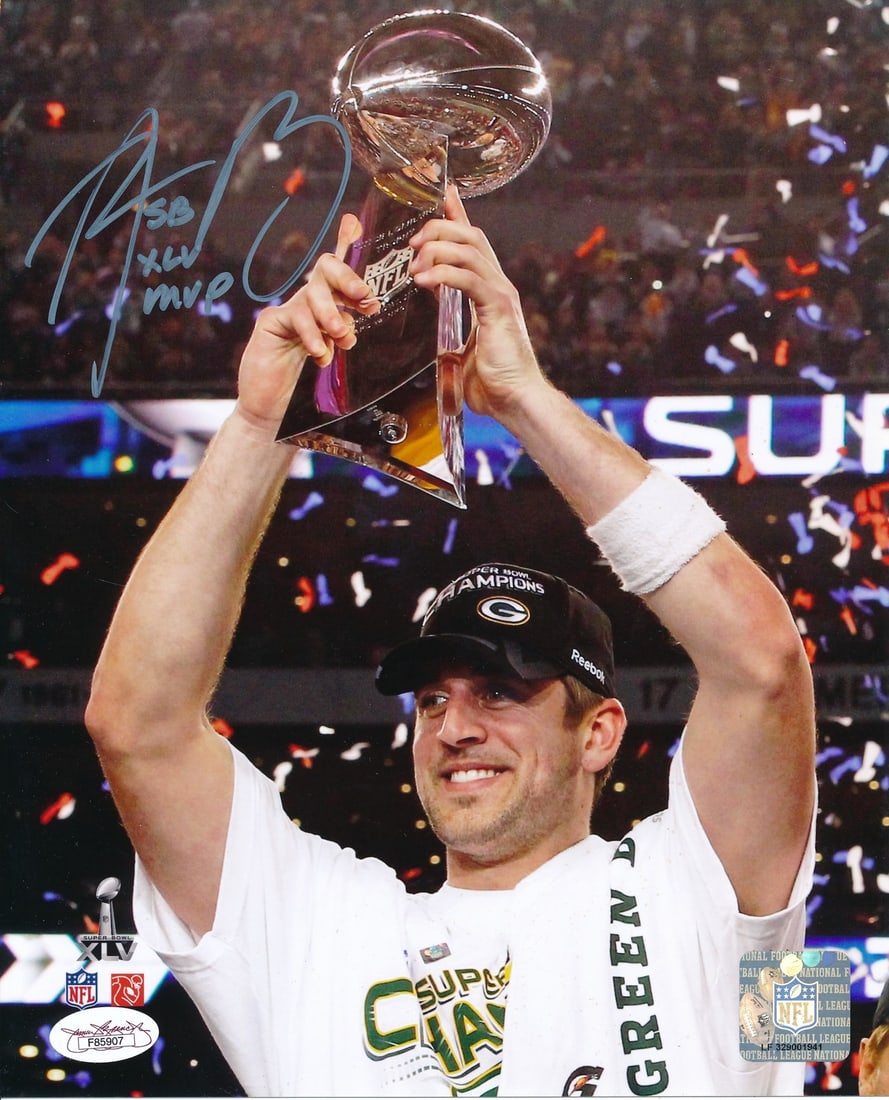 JSA Authenticated Aaron Rogers 8x10 Packers Photo with SB XLV MVP Inscription: JSA Authenticated Aaron Rogers 8x10 Packers Photo with SB XLV MVP Inscription Original 8x10 football photo signed and inscribed by Aaron Rogers with "SB XLV MVP." This Green Bay Packers piece is authe