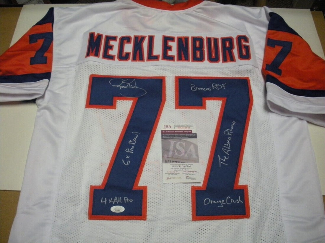 Autographed Karl Mecklenburg Denver Broncos Jersey with JSA COA: Autographed Karl Mecklenburg Denver Broncos Jersey with JSA COA This pre-owned Denver Broncos jersey is signed by Karl Mecklenberg, a member of the Ring of Honor and a 6-time Pro Bowler. The jersey is