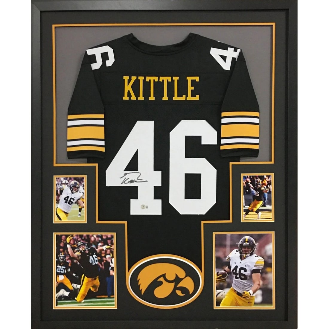 Framed Autographed George Kittle Black Iowa Hawkeyes Jersey Beckett: Framed Autographed George Kittle Black Iowa Hawkeyes Jersey Beckett Framed black Iowa Hawkeyes jersey signed by George Kittle. This autographed piece features detailed framing with logo presentation a