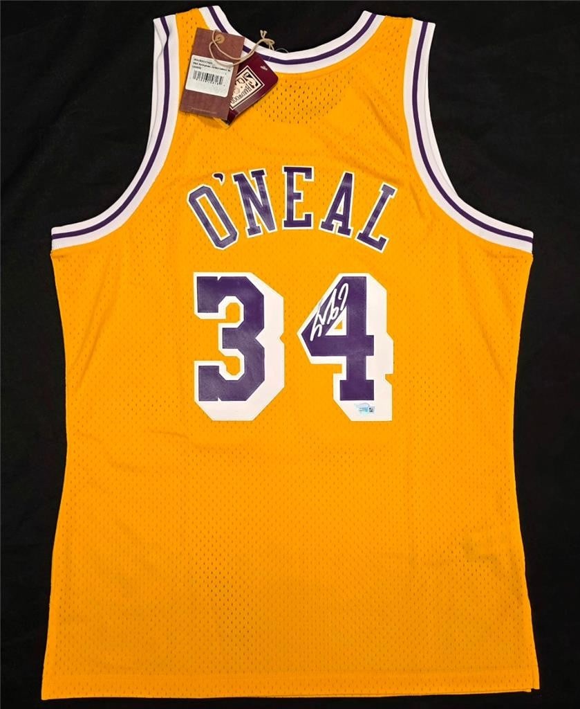 Autographed Los Angeles Lakers 1996-97 M&N Jersey Shaquille O'Neal Fanatics: Autographed Los Angeles Lakers 1996-97 M&N Jersey Shaquille O'Neal Fanatics Pre-owned Los Angeles Lakers basketball jersey signed by Shaquille O'Neal. This original autographed jersey is authenticated