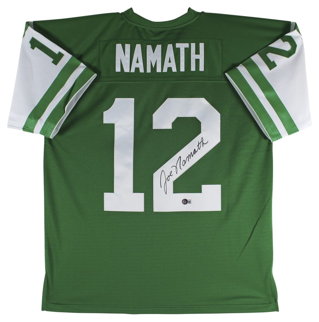 Joe Namath signed Mitchell and Ness Jets green jersey Beckett authenticated: Joe Namath signed Mitchell and Ness Jets green jersey Beckett authenticated Authentic green Mitchell & Ness jersey personally signed by Joe Namath. This original autographed New York Jets jersey inclu