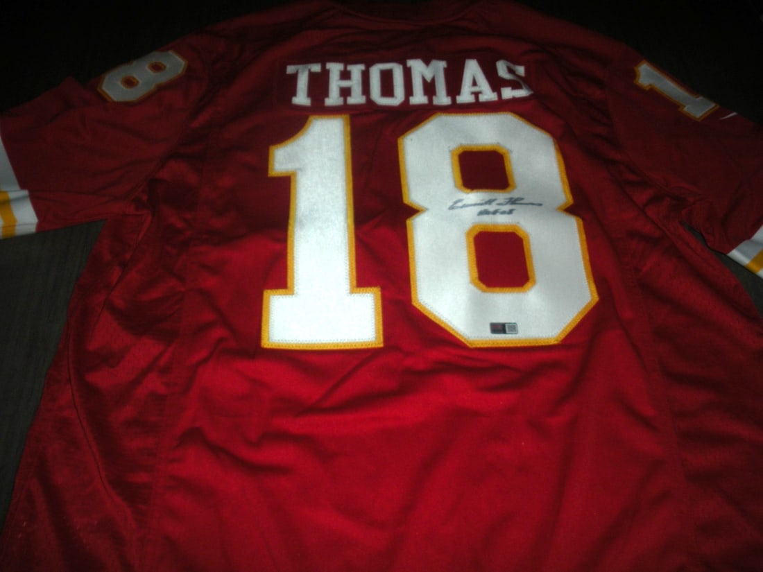 Emmitt Thomas Signed Official NFL Nike Jersey with COA: Emmitt Thomas Signed Official NFL Nike Jersey with COA This official licensed Nike jersey features the signature of Emmitt Thomas, a renowned player from the Kansas City football team. Made for footba