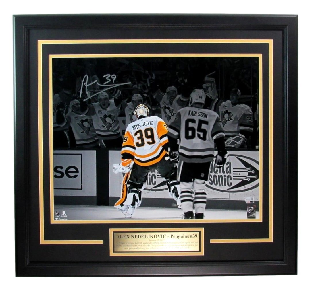 Framed Alex Nedeljkovic Penguins autographed 16x20 goal photo with inscription: Framed Alex Nedeljkovic Penguins autographed 16x20 goal photo with inscription This framed 16x20 photograph features Alex Nedeljkovic of the Pittsburgh Penguins and includes his autograph with an insc