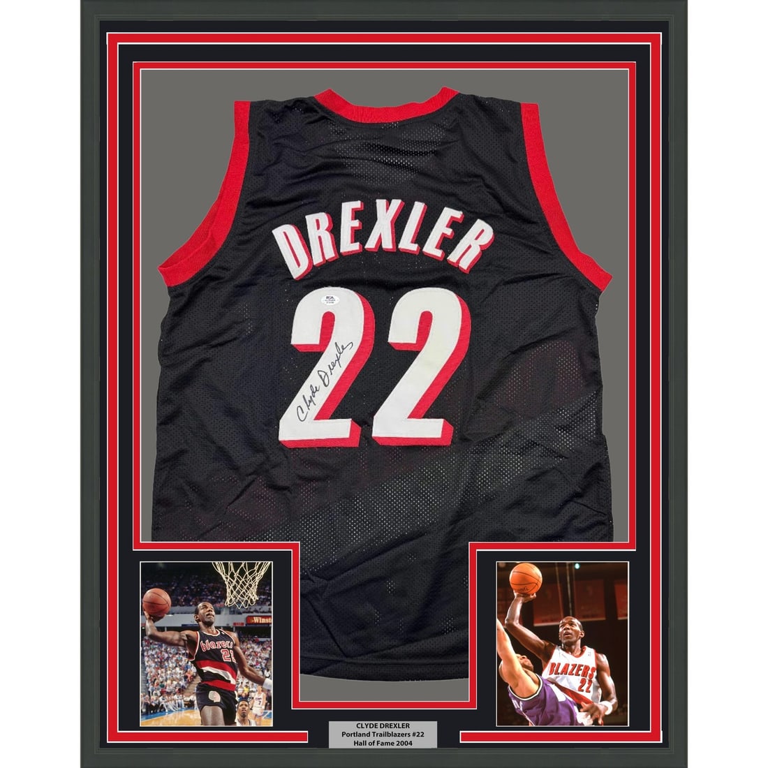 PSA Certified Clyde Drexler Signed Framed Portland Trail Blazers Jersey 35x39: PSA Certified Clyde Drexler Signed Framed Portland Trail Blazers Jersey 35x39 Professionally framed and matted black Clyde Drexler autographed jersey display featuring two 5x7 photos. This original ba