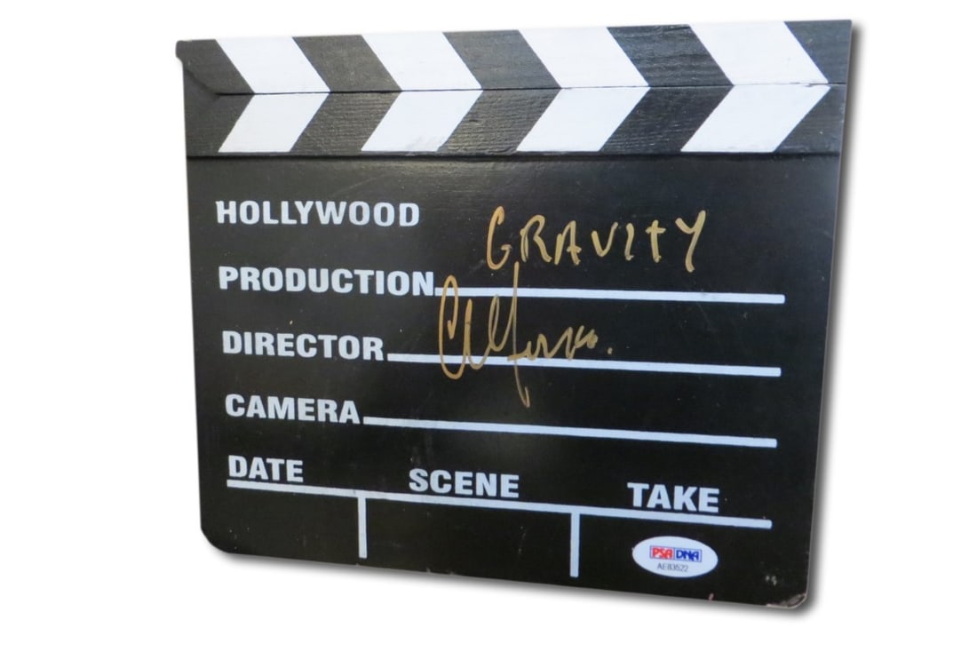 PSA DNA Signed Mini Movie Clapper Alfonso Cuaron Original: PSA DNA Signed Mini Movie Clapper Alfonso Cuaron Original Pre-owned mini movie clapper autographed by Alfonso Cuaron. This original signed collectible has been authenticated by PSA/DNA. Specifications