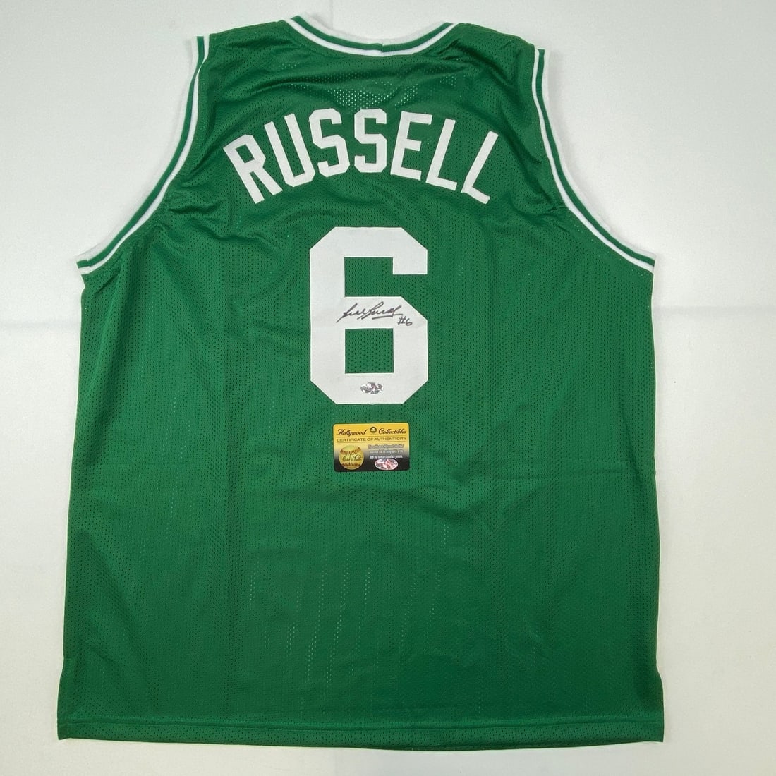 Autographed Bill Russell Boston Celtics Green Custom Jersey JSA: Autographed Bill Russell Boston Celtics Green Custom Jersey JSA Pre-owned custom green basketball jersey signed by Bill Russell. Designed as an autographed collectible, this original jersey features t