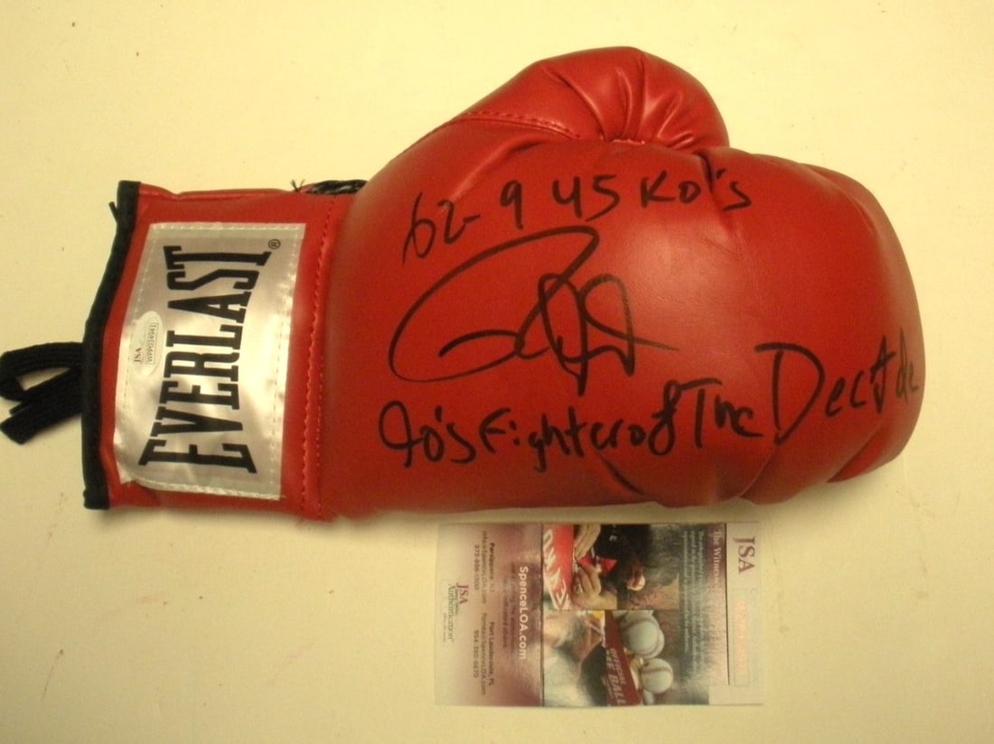 Signed Boxing Glove Roy Jones Jr Fighter of the Decade JSA COA: Signed Boxing Glove Roy Jones Jr Fighter of the Decade JSA COA Signed boxing glove featuring Roy Jones Jr., a 1990s fighter of the decade collectible. This pre-owned piece is an original boxing item a