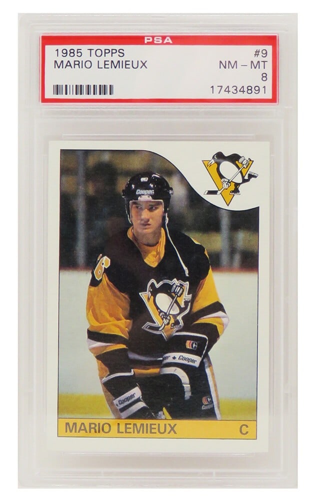 Mario Lemieux 1985 Topps Rookie Card #9 PSA 8 Pittsburgh Penguins: Mario Lemieux 1985 Topps Rookie Card #9 PSA 8 Pittsburgh Penguins This is a Mario Lemieux Pittsburgh Penguins 1985 Topps rookie trading card, numbered #9, encapsulated and graded as NM-MT (Near Mint-M