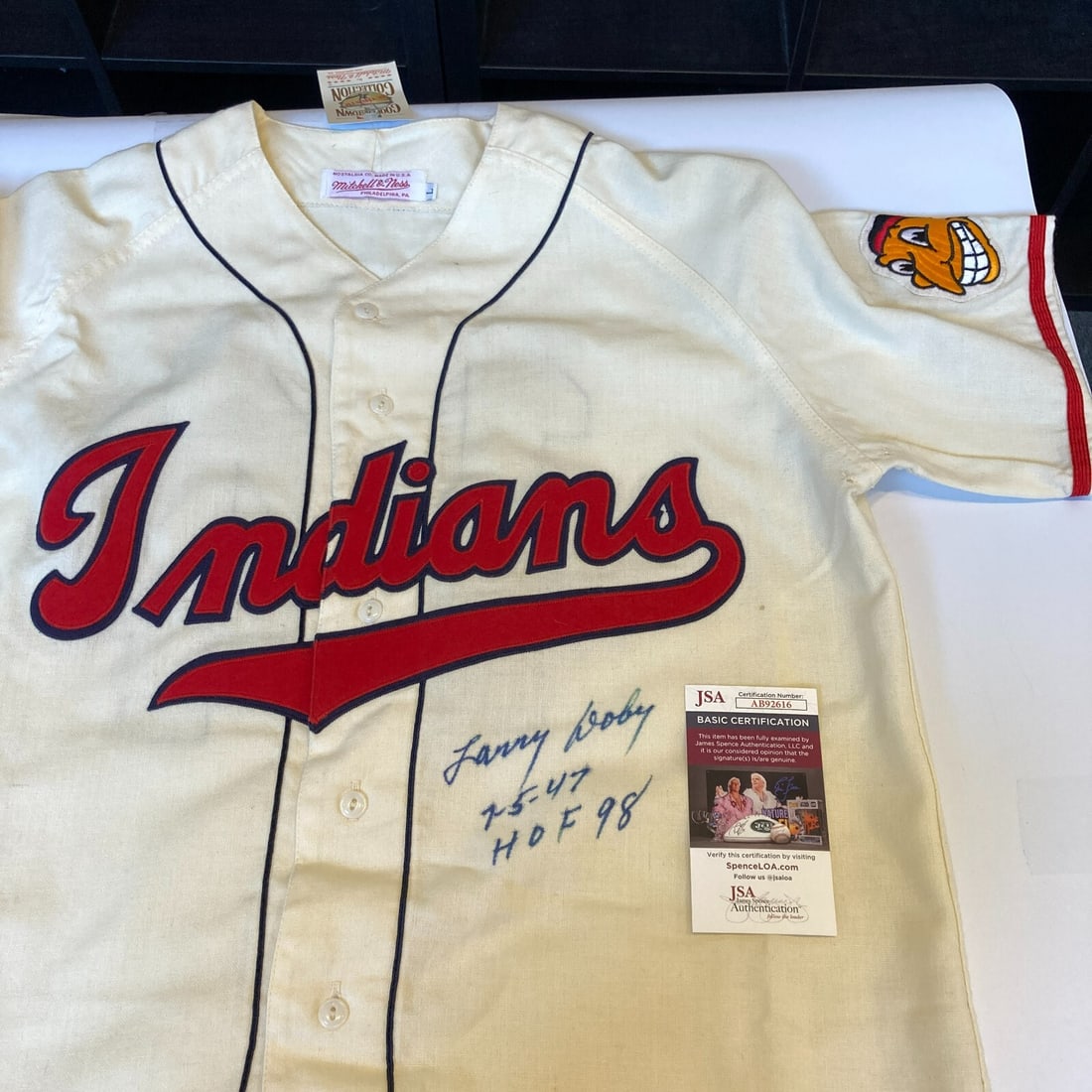 Signed Larry Doby Cleveland Indians Mitchell and Ness Jersey JSA HOF 1998: Signed Larry Doby Cleveland Indians Mitchell and Ness Jersey JSA HOF 1998 Pre-owned Cleveland Indians Mitchell & Ness baseball jersey signed by Larry Doby and inscribed "7-5-1947 Broke Color Barrier H