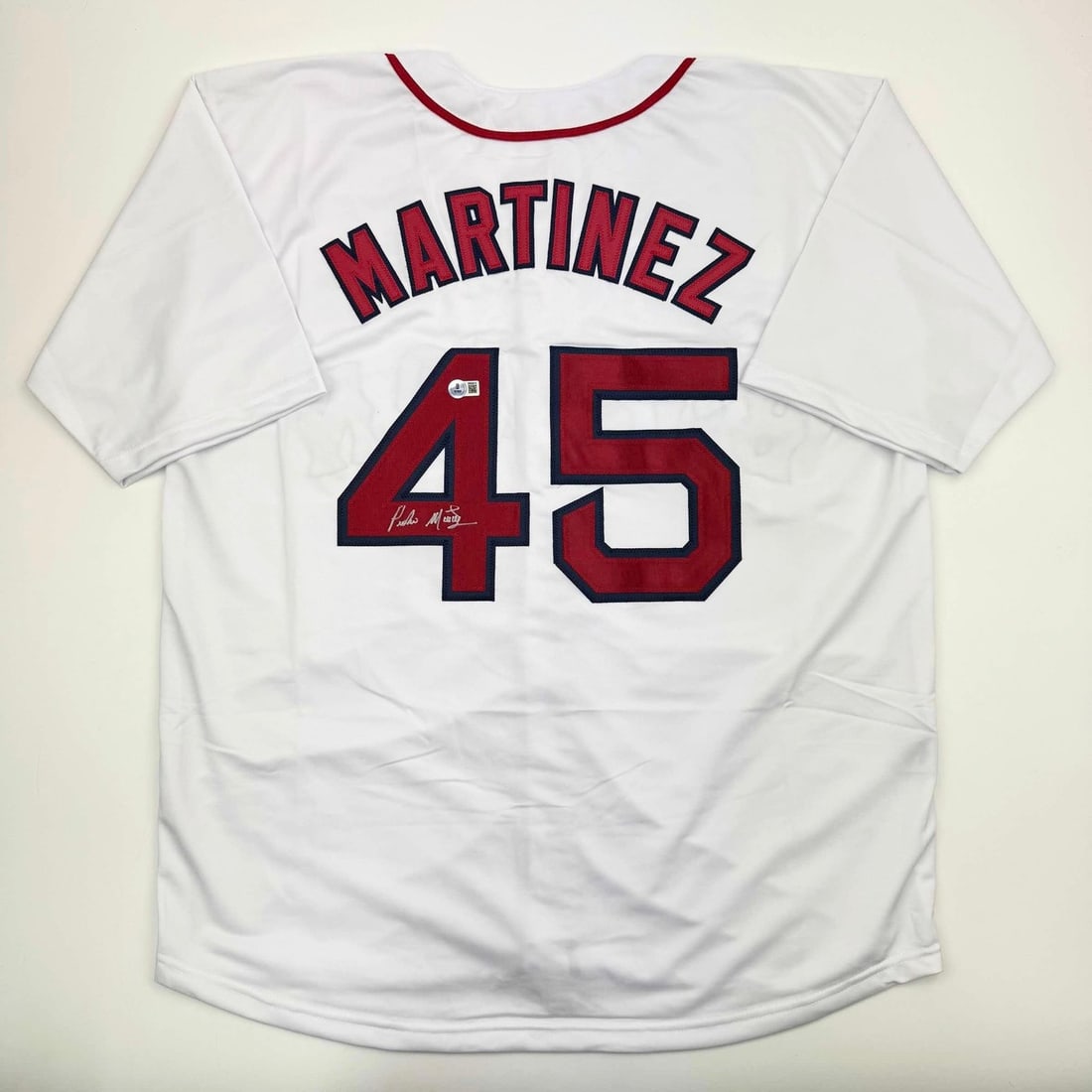 Pedro Martinez signed custom white baseball jersey JSA authentication: Pedro Martinez signed custom white baseball jersey JSA authentication Autographed Pedro Martinez custom white baseball jersey intended as a collectible display piece. The jersey features the player's 
