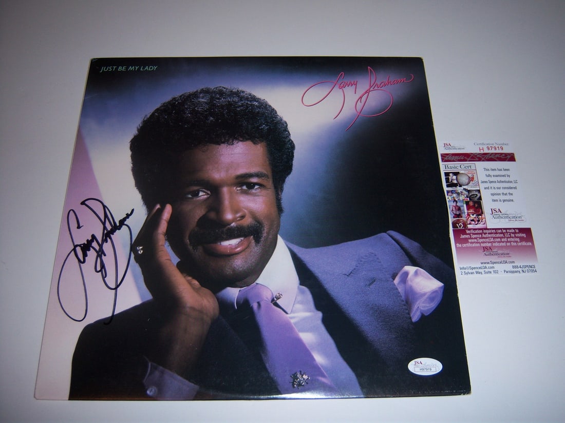 Signed Larry Graham Just Be My Lady LP Album with JSA COA: Signed Larry Graham Just Be My Lady LP Album with JSA COA This is an original "Just Be My Lady" LP record album by Larry Graham, featuring a signed cover. The album includes authentication by JSA/COA.