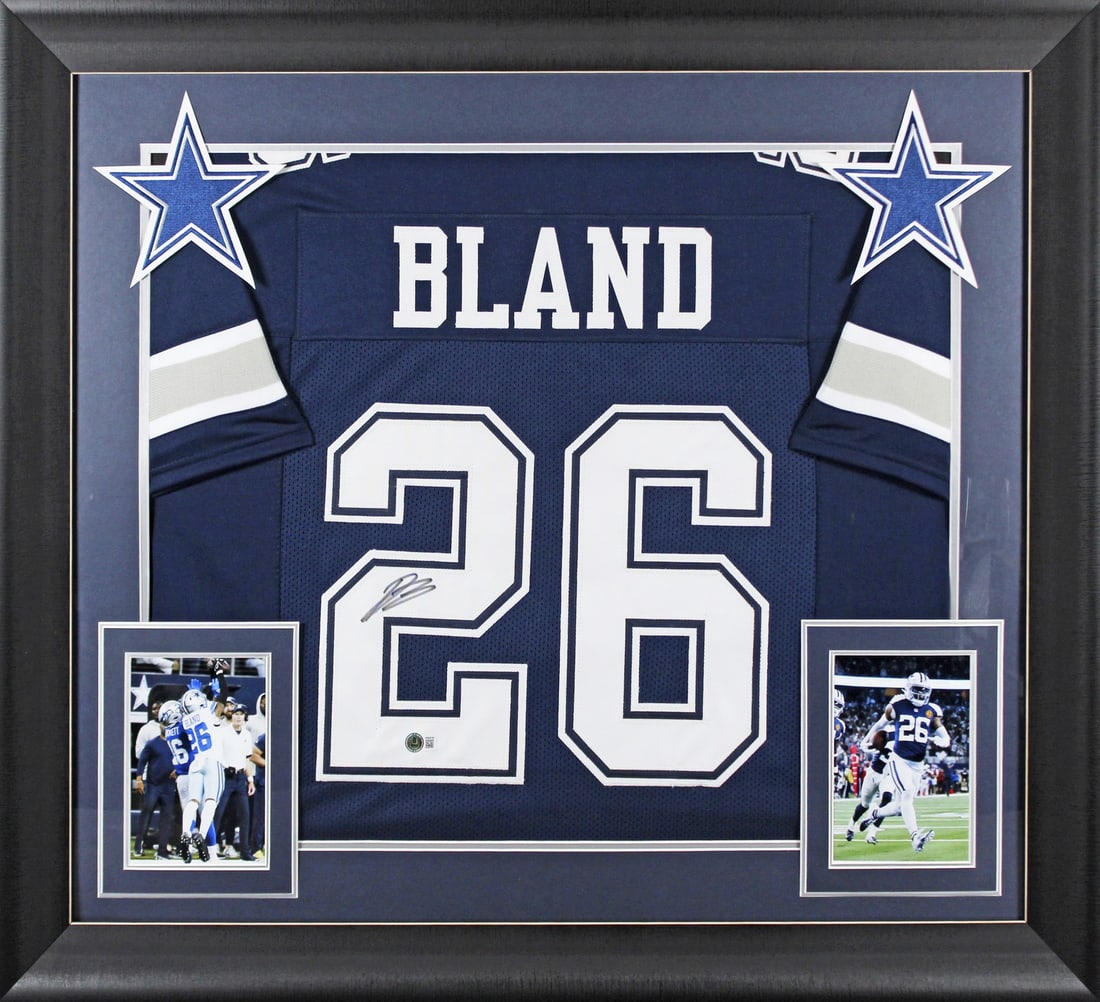 Framed Navy Jersey Signed by Daron Bland Beckett Witnessed: Framed Navy Jersey Signed by Daron Bland Beckett Witnessed Authentic signed navy pro style framed jersey personally autographed by Daron Bland of the Dallas Cowboys. This original piece is a BAS Witne