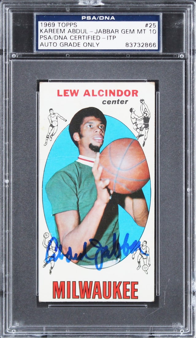 1969 Topps #25 Kareem Abdul-Jabbar rookie card signed PSA DNA slab: 1969 Topps #25 Kareem Abdul-Jabbar rookie card signed PSA DNA slab Autographed 1969 Topps #25 rookie card featuring Kareem Abdul-Jabbar of the Milwaukee Bucks. The card is graded Auto 10 and is housed