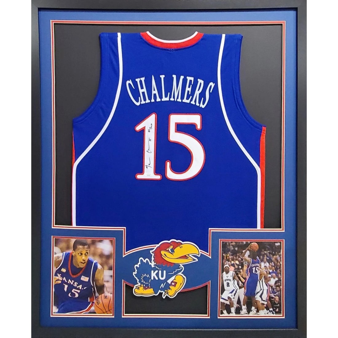 Framed Kansas Jayhawks Jersey Signed by Mario Chalmers JSA: Framed Kansas Jayhawks Jersey Signed by Mario Chalmers JSA Pre-owned framed Kansas Jayhawks jersey autographed by Mario Chalmers. The piece is authenticated by JSA and includes a tamper-proof sticker 