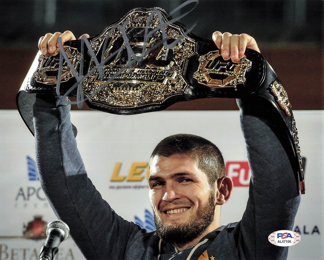 PSA DNA authenticated Khabib Nurmagomedov 8x10 MMA photo: PSA DNA authenticated Khabib Nurmagomedov 8x10 MMA photo This is a professionally printed 8x10 photograph featuring Khabib Nurmagomedov of the UFC, personally signed by Khabib. The photo is an origina