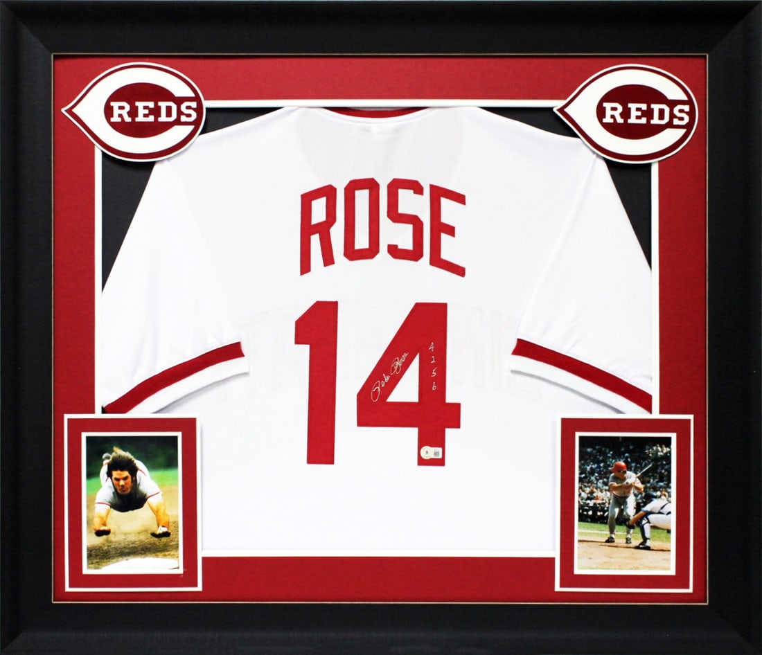 Framed Pete Rose Signed White Jersey 4256 Beckett Authentic: Framed Pete Rose Signed White Jersey 4256 Beckett Authentic Professionally framed white pro style jersey personally signed by Pete Rose and inscribed "4256." This X-Large custom-stitched jersey is an 