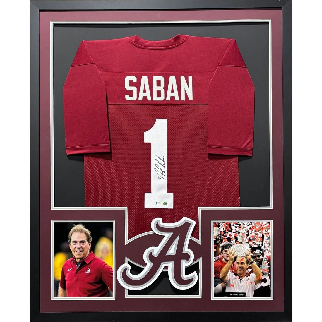 Beckett Authenticated Framed Alabama Jersey Signed by Nick Saban: Beckett Authenticated Framed Alabama Jersey Signed by Nick Saban Framed autographed Nick Saban jersey featuring Alabama. Professionally presented with detailed framing and a logo display, this piece i