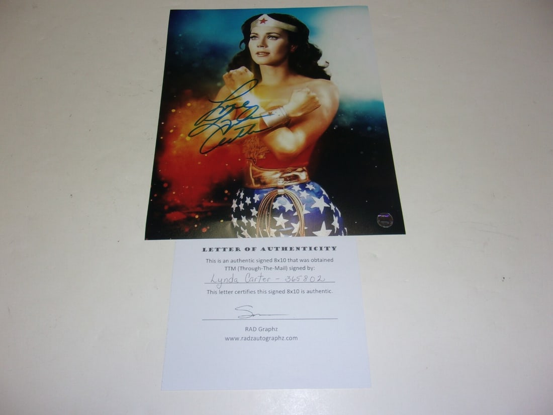 Lynda Carter Autographed 8x10 Wonder Woman Photograph With Certificate of Authenticity: Lynda Carter Autographed 8x10 Wonder Woman Photograph With Certificate of Authenticity This is an 8x10 photograph signed by the famous actress Lynda Carter, known for her role as Wonder Woman. The ite