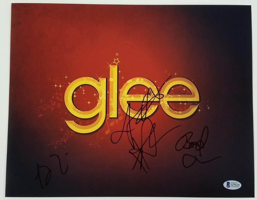 11x14 GLEE Cast Autographed Photo Beckett BAS COA: 11x14 GLEE Cast Autographed Photo Beckett BAS COA Original 11x14 signed photo from GLEE cast members, including Buecker, Tobin, Shum, and one additional signer. Pre-owned item. Specifications Item Typ