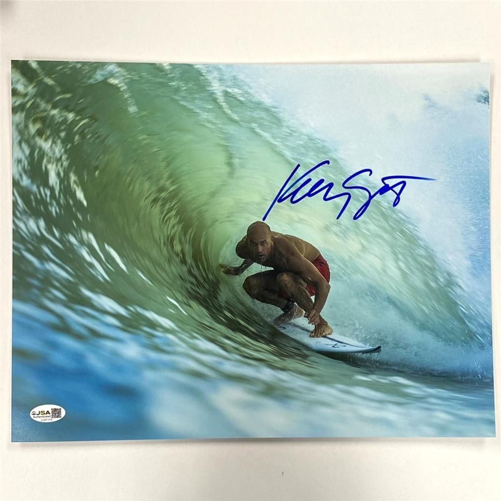 Autographed 11x14 Surfing Photograph Kelly Slater Original JSA: Autographed 11x14 Surfing Photograph Kelly Slater Original JSA Original signed photograph of surfing champion Kelly Slater. This pre-owned 11x14 photo is autographed and includes JSA authentication. S