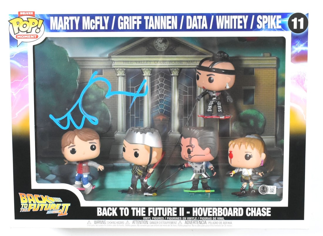 Funko Pop Back to the Future Deluxe #11 signed by Michael J. Fox BAS: Funko Pop Back to the Future Deluxe #11 signed by Michael J. Fox BAS Pre-owned deluxe Funko figure from Back to the Future, autographed by Michael J. Fox. This collectible includes Beckett Authenticat