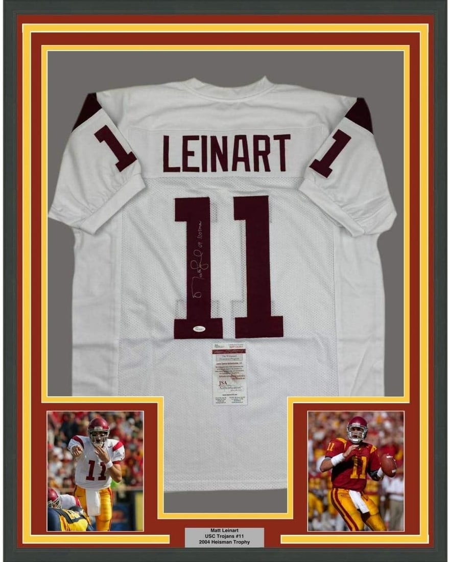 Matt Leinart Autographed USC Trojans Framed White Jersey 35x39 JSA: Matt Leinart Autographed USC Trojans Framed White Jersey 35x39 JSA Professionally framed and matted white USC Trojans jersey signed by Matt Leinart. This original autographed football display includes