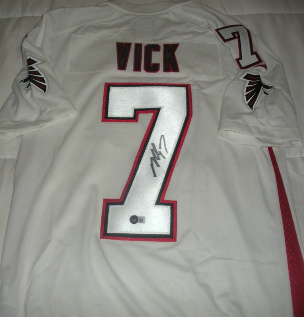 Nike Atlanta Falcons Michael Vick autographed jersey Beckett COA: Nike Atlanta Falcons Michael Vick autographed jersey Beckett COA Pre-owned official licensed Nike Atlanta Falcons jersey signed by Michael Vick. This original collectible autograph piece is a