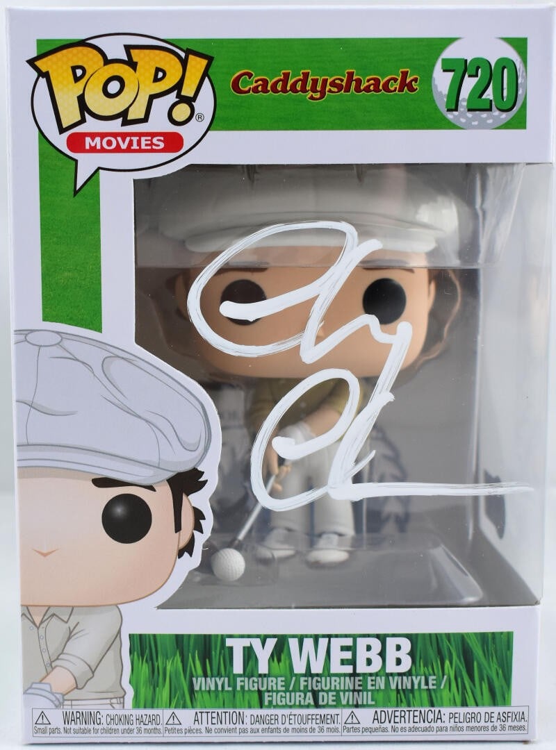 Funko TY Webb Vinyl Figure 720 signed by Chevy Chase Beckett hologram: Funko TY Webb Vinyl Figure 720 signed by Chevy Chase Beckett hologram Pre-owned Funko vinyl figure featuring TY Webb from Caddyshack, autographed by Chevy Chase. This figurine is identified as #720