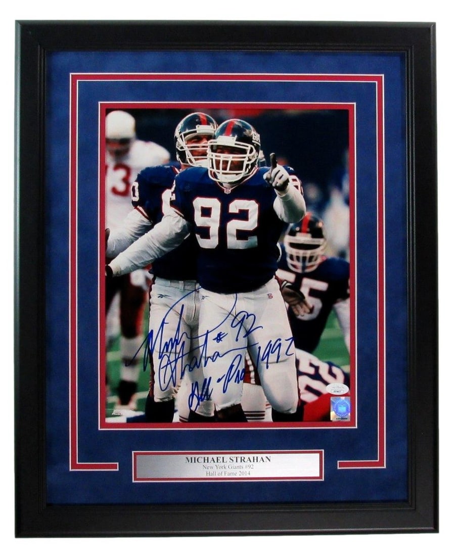 Michael Strahan Signed Framed 11x14 Photo New York Giants JSA Authenticated: Michael Strahan Signed Framed 11x14 Photo New York Giants JSA Authenticated Celebrate the legacy of Michael Strahan with this beautifully framed 11x14 photo featuring his Hall of Fame inscription.