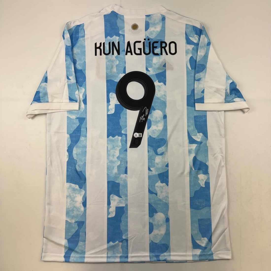 Argentina Blue Soccer Jersey Signed by Sergio Aguero Beckett COA: Argentina Blue Soccer Jersey Signed by Sergio Aguero Beckett COA Pre-owned blue Argentina soccer jersey signed by Sergio Kun Aguero. This original autographed jersey comes with third-party authenticat