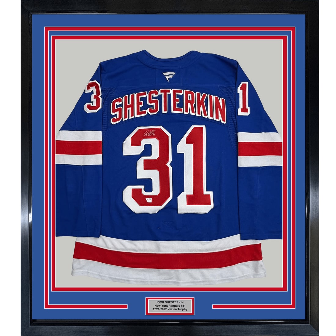 35x39 Framed Igor Shesterkin Signed Rangers Blue Jersey Fanatics Authentic: 35x39 Framed Igor Shesterkin Signed Rangers Blue Jersey Fanatics Authentic Professionally framed and matted signed blue New York Rangers jersey featuring Igor Shesterkin. This original autographed dis