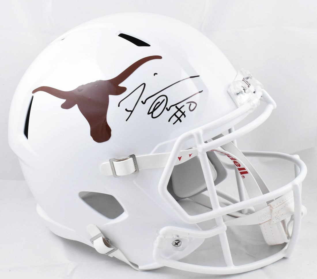 Texas Longhorns Full Size Speed Helmet Signed by DeMarvion Overshown BAS: Texas Longhorns Full Size Speed Helmet Signed by DeMarvion Overshown BAS This pre-owned Texas Longhorns full-size Speed helmet has been autographed by DeMarvion Overshown. The helmet is an original it