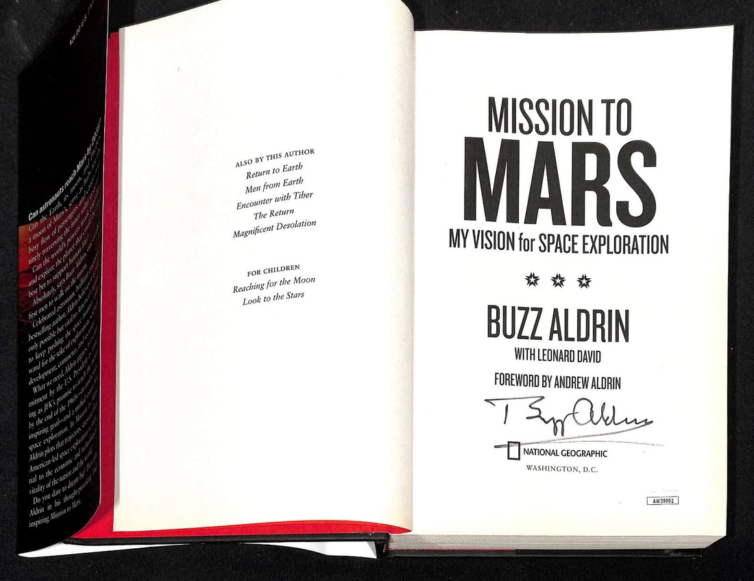 Buzz Aldrin Signed Mission To Mars HC Book JSA Authentication: Buzz Aldrin Signed Mission To Mars HC Book JSA Authentication Explore the cosmos with this pre-owned hardcover book titled "Mission To Mars" featuring the signature of renowned astronaut Buzz Aldrin. 