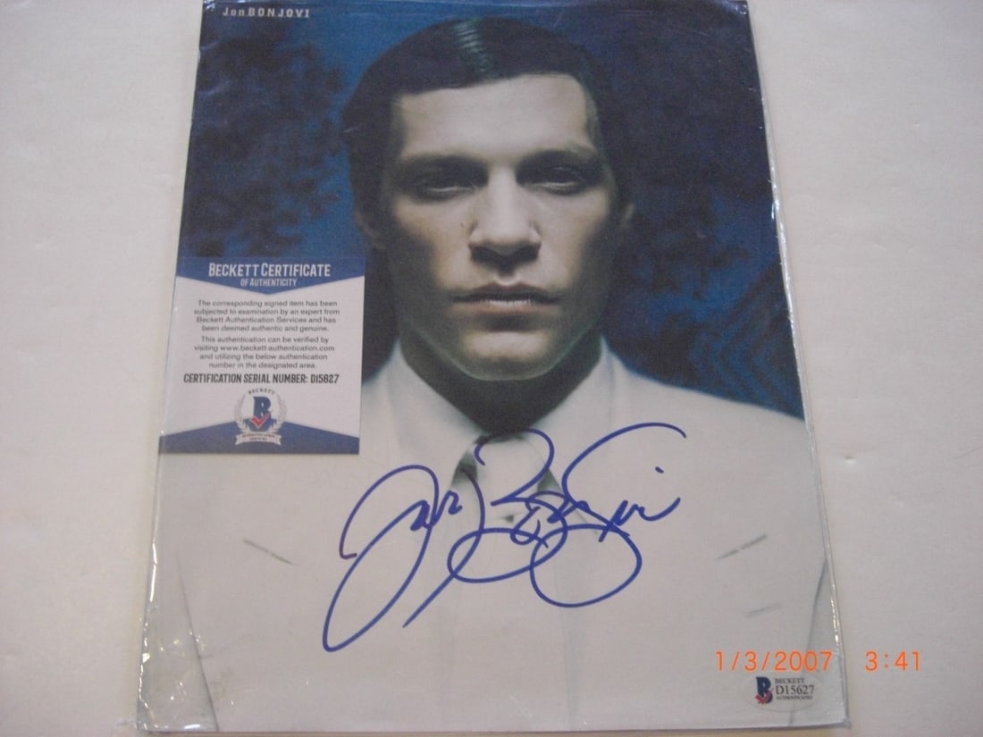 Signed 8x10 Photo Jon Bon Jovi Anne Heche Living on a Prayer with COA: Signed 8x10 Photo Jon Bon Jovi Anne Heche Living on a Prayer with COA This is an original 8x10 photograph featuring Jon Bon Jovi and Anne Heche. The photograph has been signed and includes a Beckett C