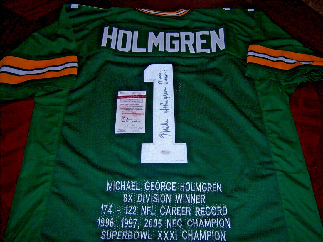 Mike Holmgren signed Green Bay Packers jersey JSA COA: Mike Holmgren signed Green Bay Packers jersey JSA COA This Green Bay Packers jersey commemorates their Super Bowl XXXI championship and is signed by Mike Holmgren. The jersey is an original collectibl