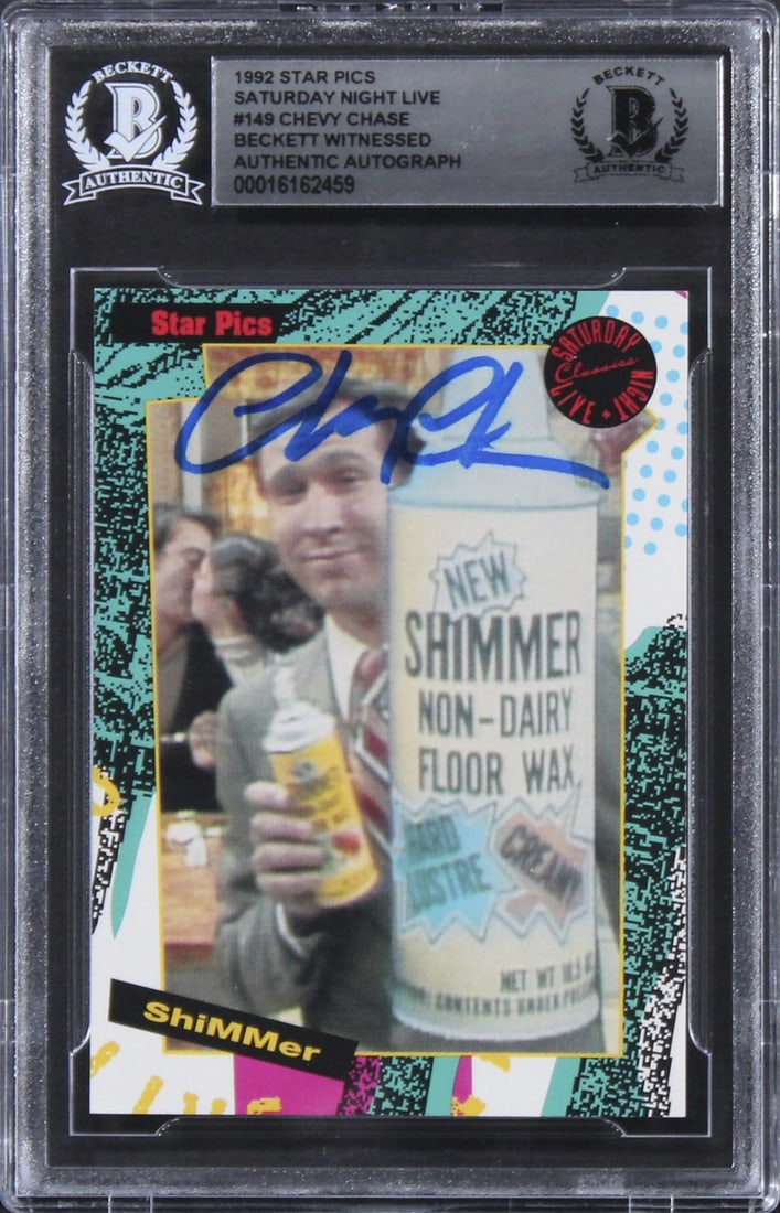Chevy Chase Autographed 1992 Star Pics Card Beckett Authenticated Slab: Chevy Chase Autographed 1992 Star Pics Card Beckett Authenticated Slab This is an original 1992 Star Pics #149 trading card featuring Chevy Chase from Saturday Night Live. The card is personally signe