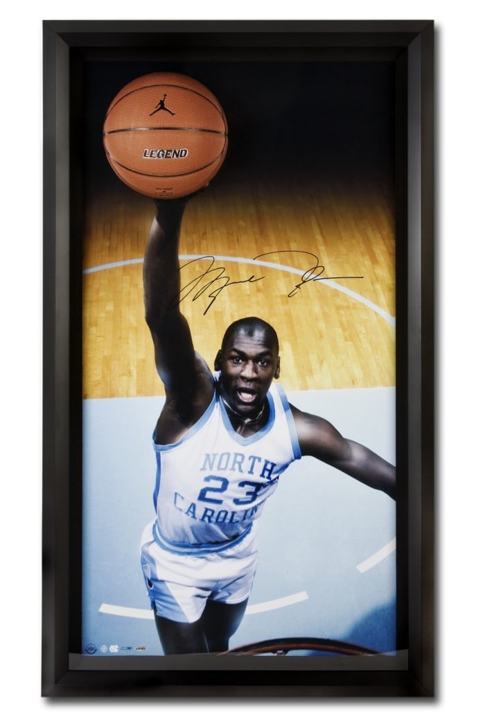 Upper Deck Signed Michael Jordan 25x45 Framed North Carolina Photo: Upper Deck Signed Michael Jordan 25x45 Framed North Carolina Photo Autographed Michael Jordan framed print featuring the North Carolina Breakthru image. This original piece is authenticated by Upper D