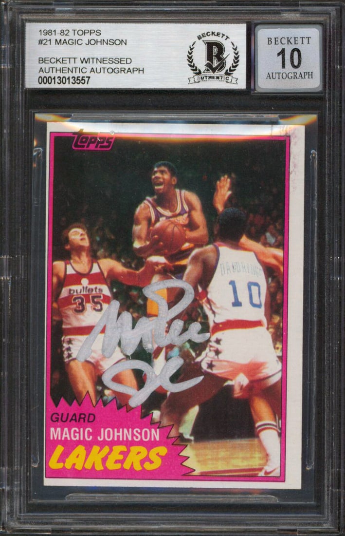 1981 Topps #21 Magic Johnson Signed Card Beckett Slab Gem Mint 10 Auto: 1981 Topps #21 Magic Johnson Signed Card Beckett Slab Gem Mint 10 Auto This 1981 Topps #21 basketball card features an authentic hand-signed autograph by Magic Johnson of the Los Angeles Lakers. The c