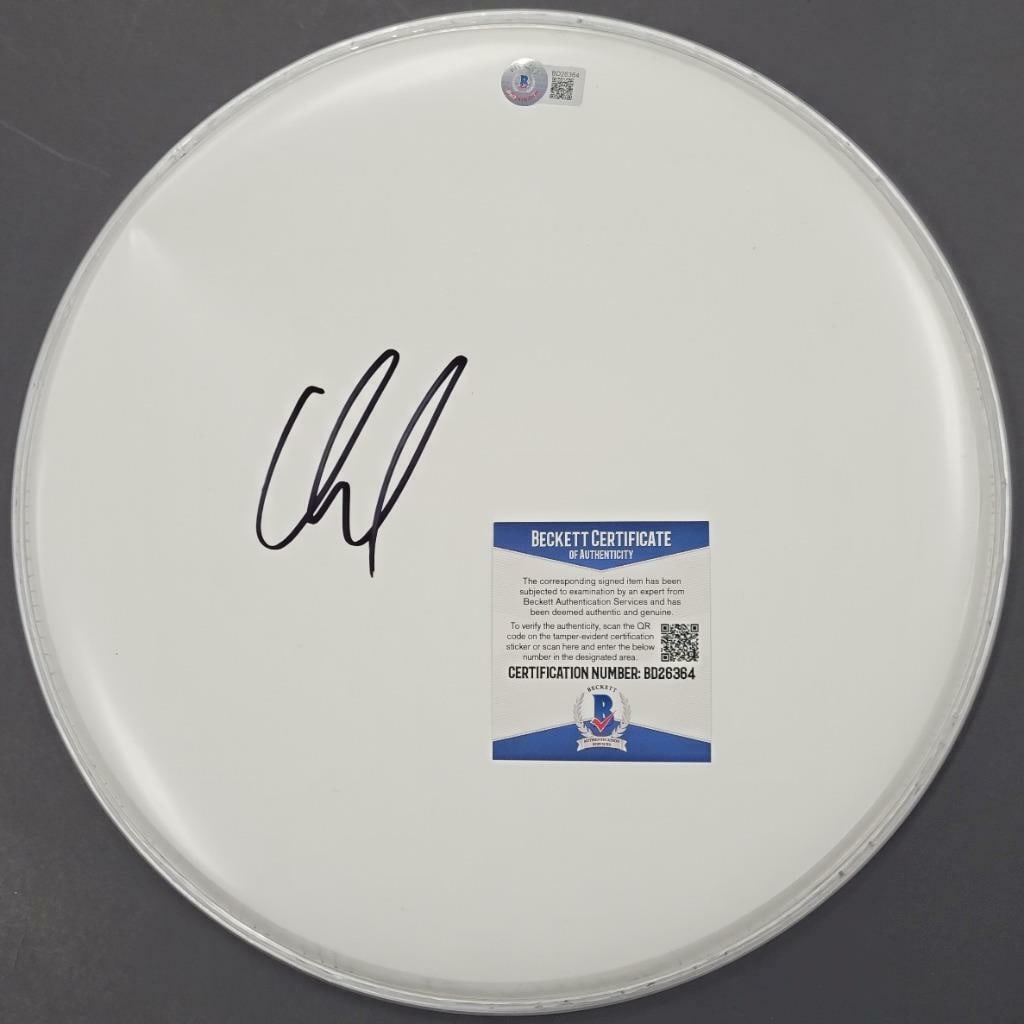 David Draiman Autographed 12 Inch Drumhead With Beckett BAS Authentication: David Draiman Autographed 12 Inch Drumhead With Beckett BAS Authentication This original 12-inch drumhead is signed by David Draiman, the vocalist of Disturbed. The autograph has been authenticated by